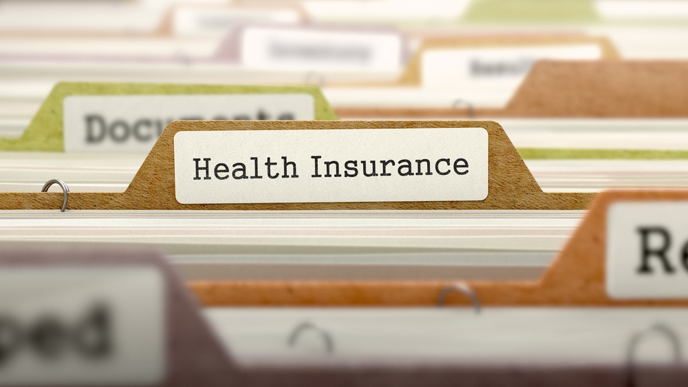 Health Insurance - Folder Register Name in Directory. Colored, Blurred Image. Closeup View.-2