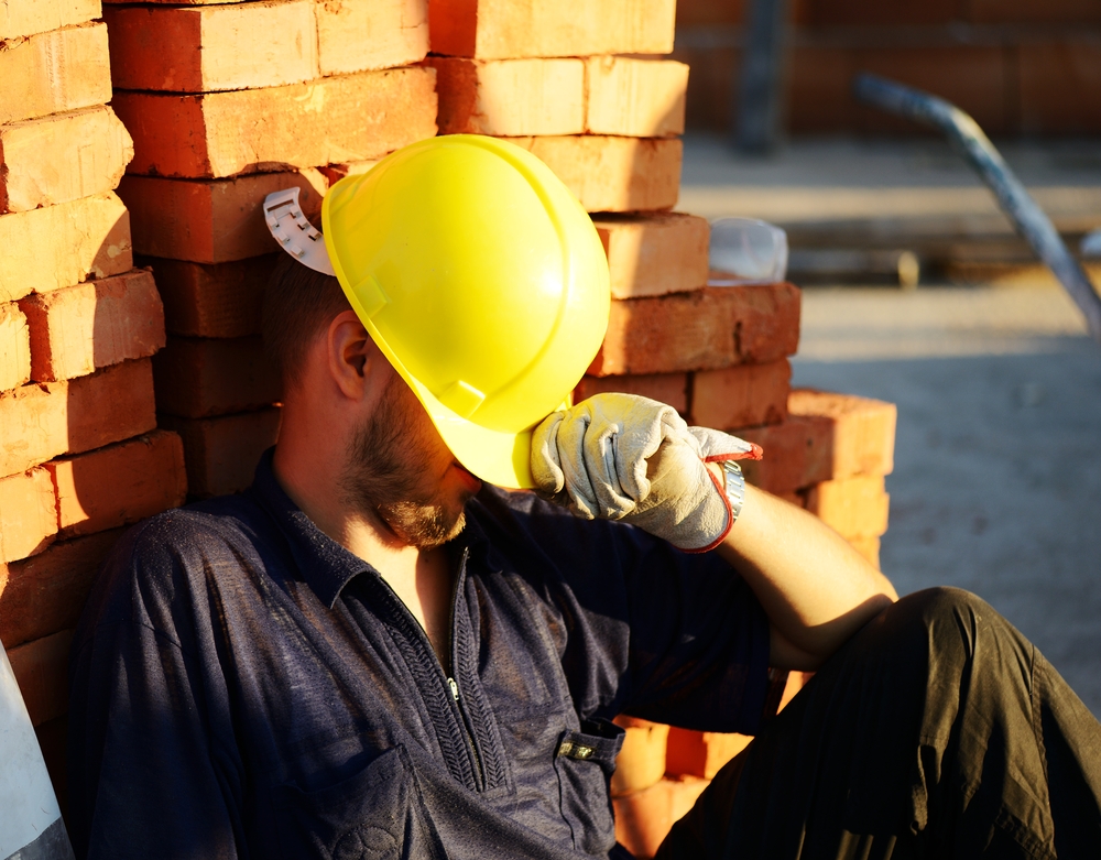 Workers on building construction site